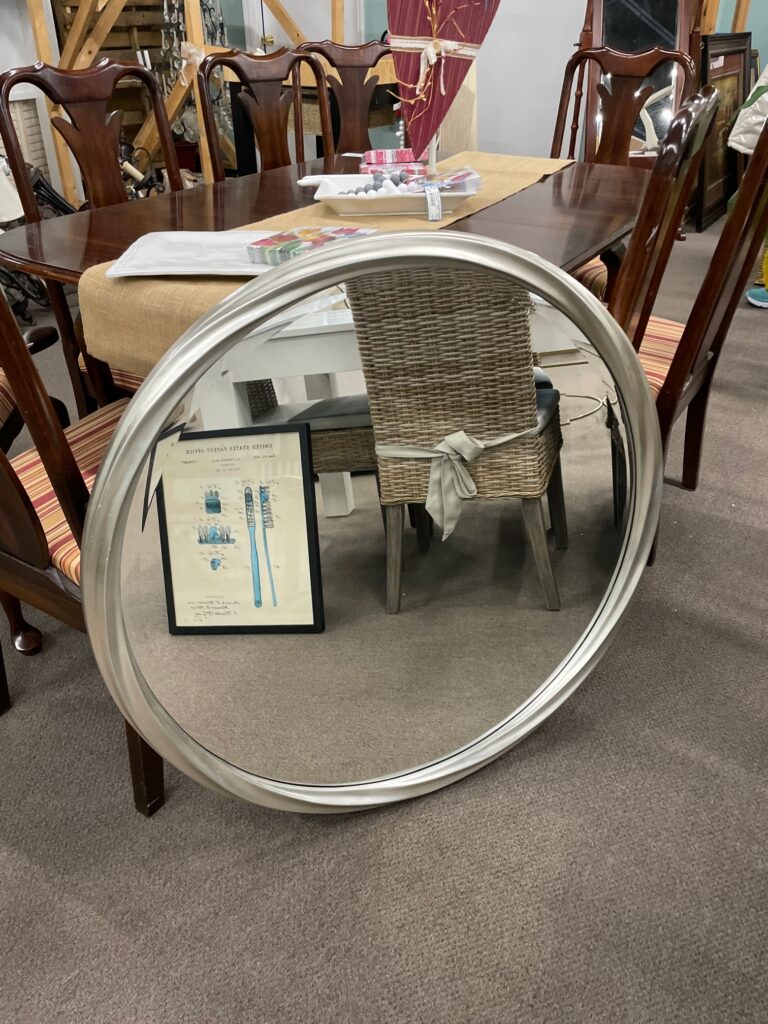 round silver mirror
